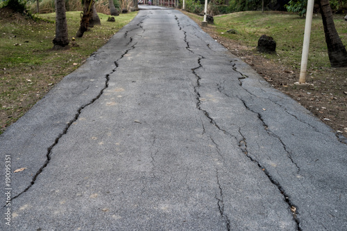 Cracked asphalt road after earthquake