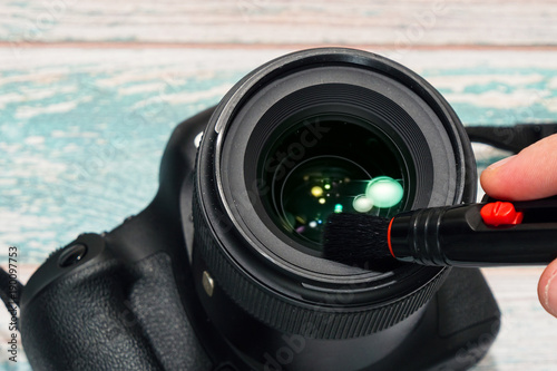 Digital SLR camera lens cleaning photo