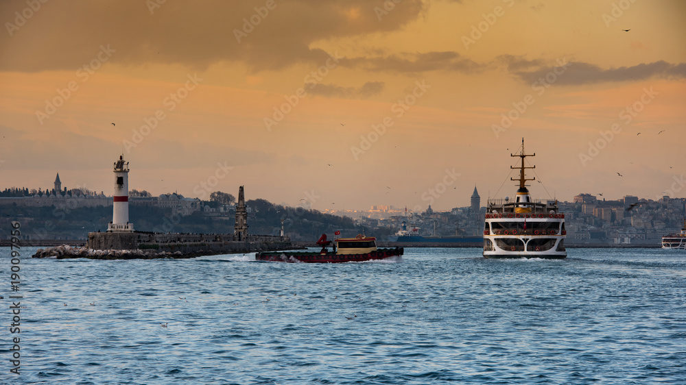 Fototapeta premium Istanbul passenger ferries at sunset. Kadikoy district, Istanbul city, Turkey