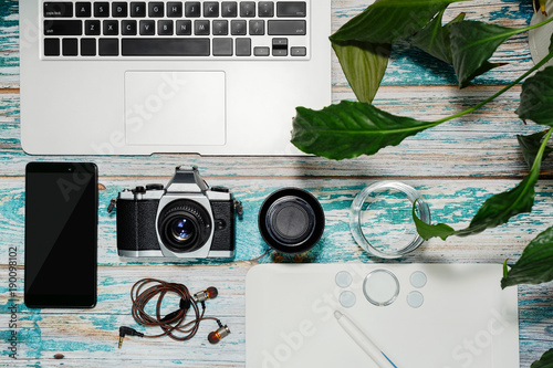 Wallpaper Mural Photographer equipment collected on vintage table Torontodigital.ca