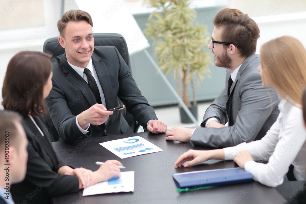 businessman at a meeting with employees