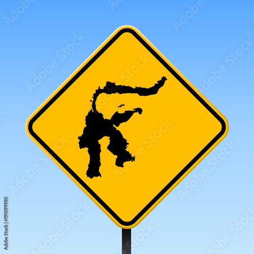 Square poster with Sulawesi island map on yellow rhomb road sign. Vector illustration. photo