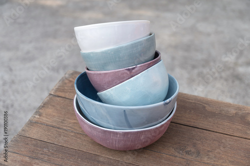 Fotografía Empty bowl on rustic wood, Japanese handmade ceramic bowl