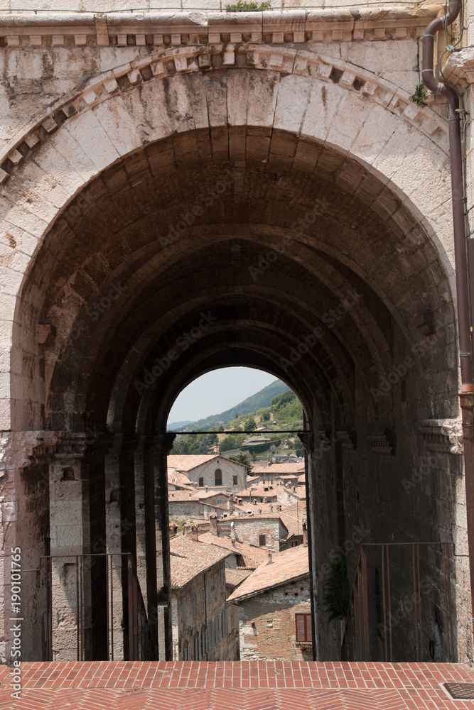 Gubbio, medieval under passage with view.