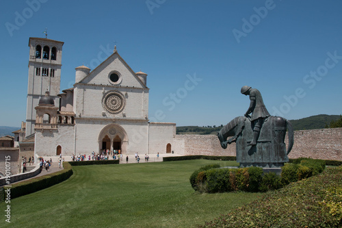 Basilica of San Francesco d'Assisi, facade of the Upper Church with St Francis statue on horse.