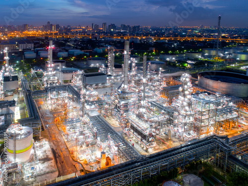 Aerial view of twilight of oil refinery ,Shot from drone of Oil refinery and Petrochemical plant at dusk , Bangkok, Thailand © Getty Gallery