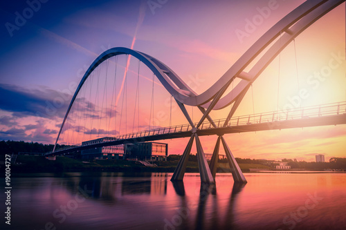 Fototapeta Naklejka Na Ścianę i Meble -  Infinity Bridge on dramatic sky at sunset in Stockton-on-Tees, UK.