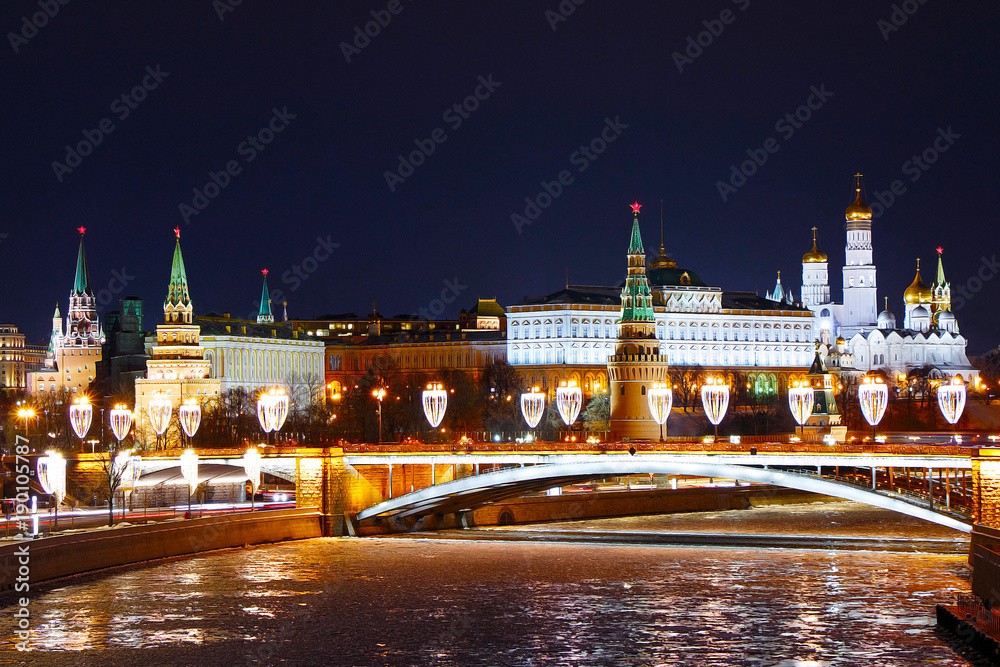Russia. Moscow. A view of the Kremlin at night and the embankment in winter.