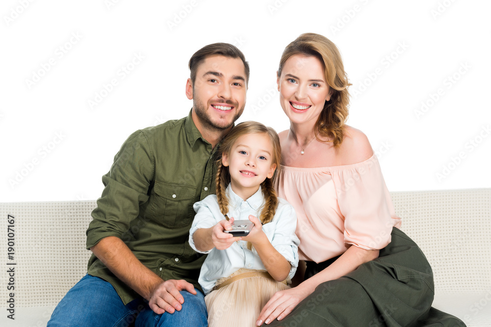 smiling family watching tv together isolated on white smiling family watching tv together isolated on white