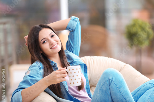 Beautiful young woman with ...