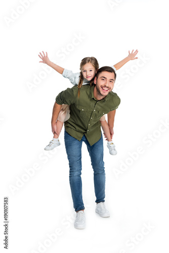 happy father and daughter piggybacking together isolated on white