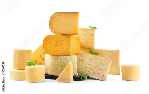 Different types of delicious cheese on white background