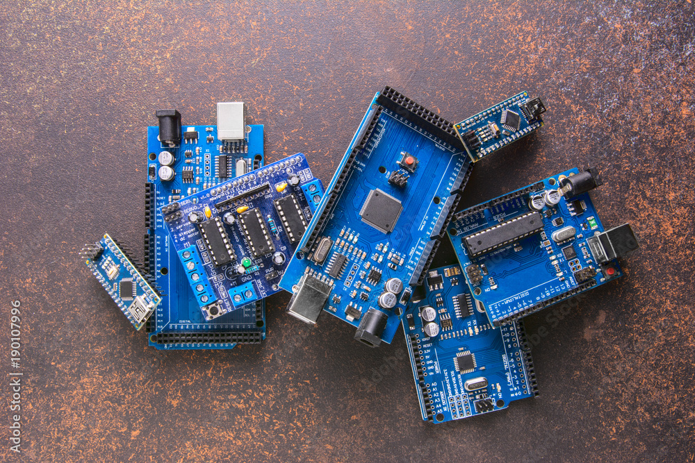 Arduino Mega Uno Nano Board Flat Layout On A Rusty Vintage Background Arduino Mega Uno Nano Board Flat Layout On A Rusty Vintage Background