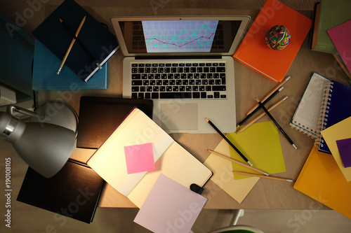 Canvas Print Comfortable workplace with laptop on desk at home
