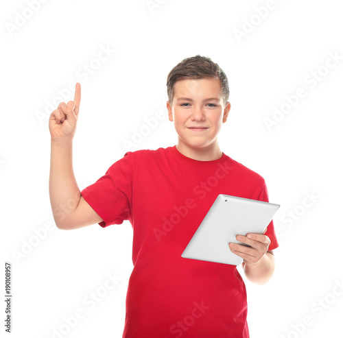 Teenage boy with tablet com...