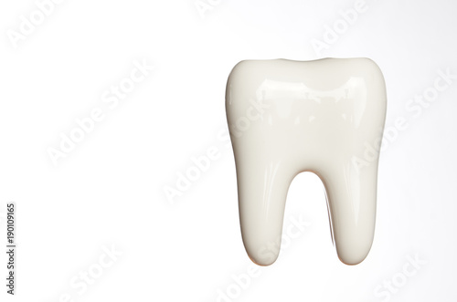 Fototapeta Naklejka Na Ścianę i Meble -  White enamel tooth model isolated on white