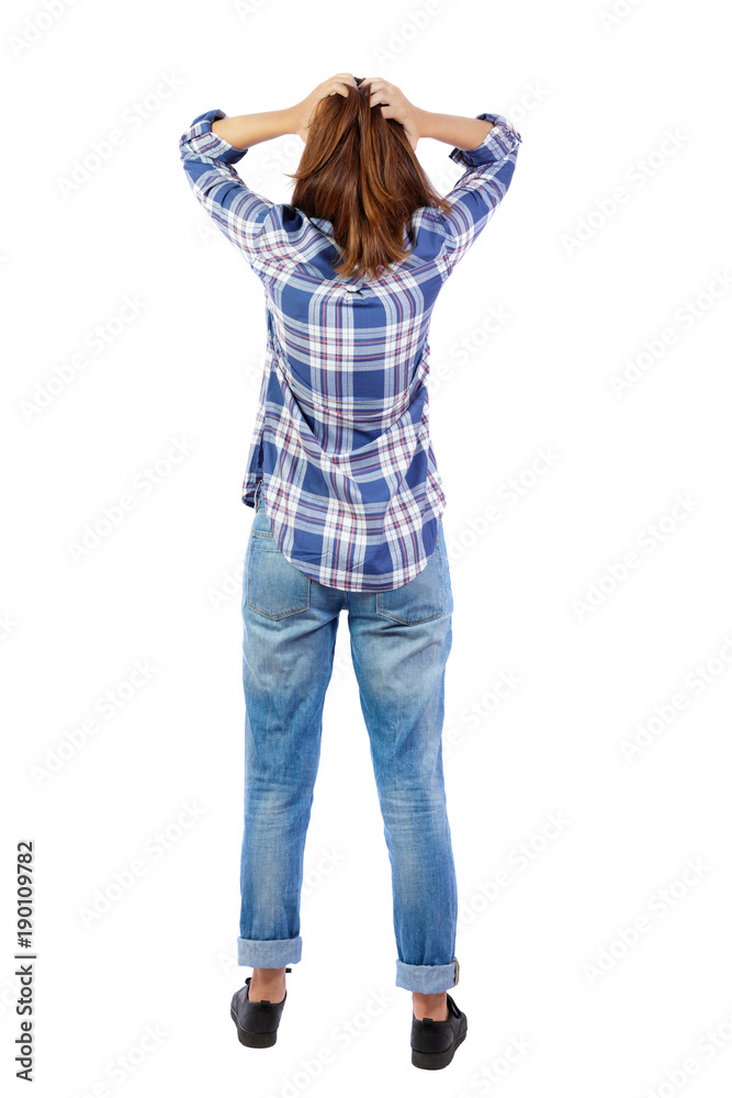 Back view of shocked woman in jeans. Back view of shocked woman in jeans.