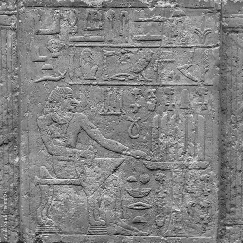 ancient stone relief at Chnum temple in Egypt photo