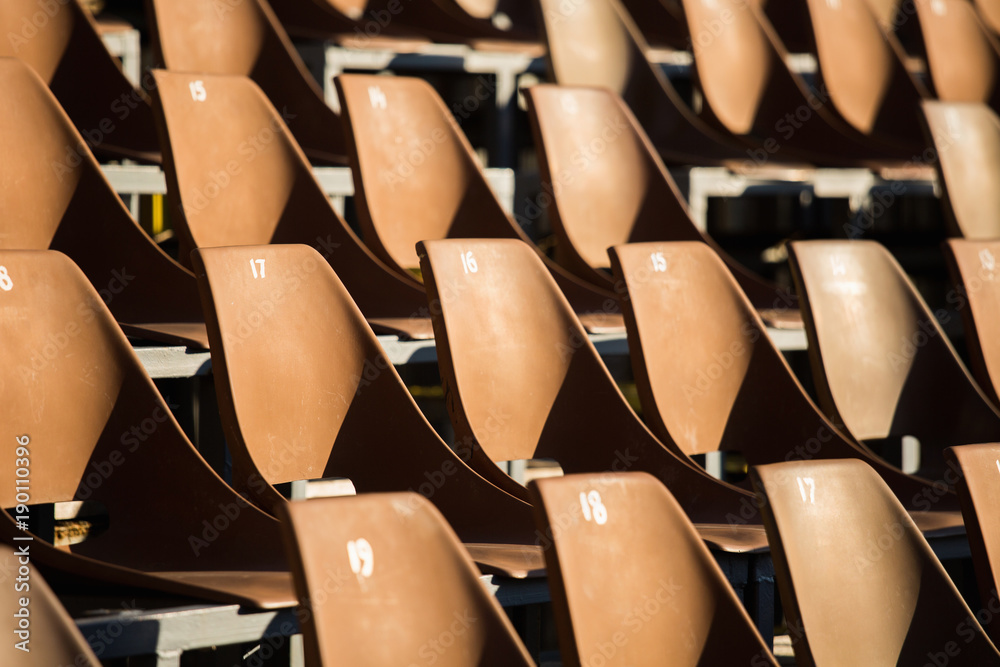 Obraz premium Plastic seats in the stadium