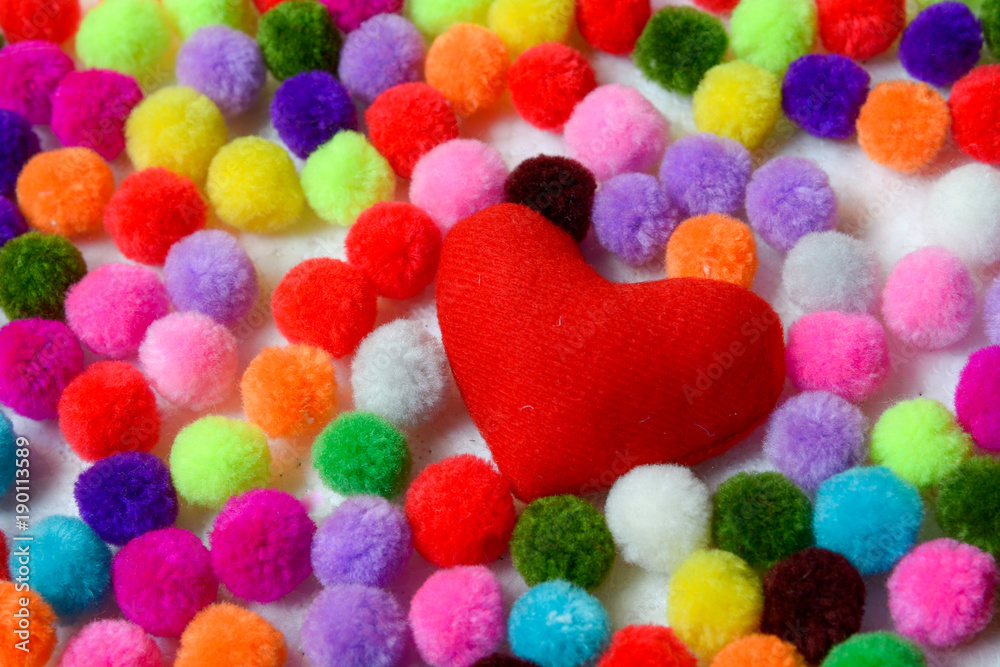 Red Heart with colorful pom pom background, Valentine concept Red Heart with colorful pom pom background, Valentine concept