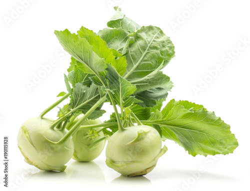 Kohlrabi (German turnip or turnip cabbage) isolated on white background three raw bulbs with fresh leaves.