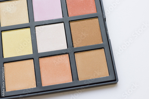 Make Up Beauty Fashion Concept. Daily make up eyeshadow palette on white  close up