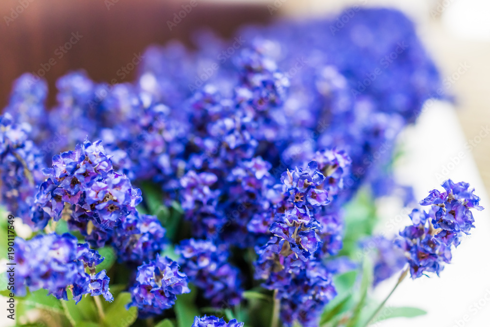 Blue purple tall long fake lupine flowers as decoration Blue purple tall long fake lupine flowers as decoration
