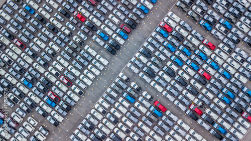 Tablou pe pânză Aerial view new car lined up in the port for dealership business import and export, New car lined up parking lot outside an automobile automotive factory distribution for sale