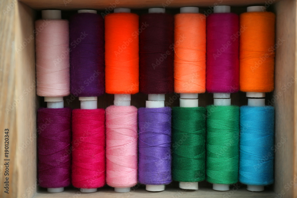 Set of color sewing threads in wooden box Set of color sewing threads in wooden box