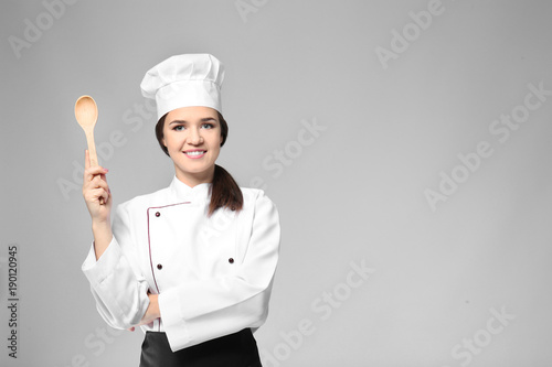 Portrait of female chef wit...
