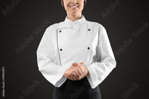 Female chef in uniform on b...