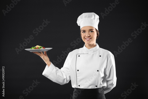 Portrait of female chef wit...