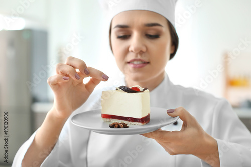 Female chef preparing tasty...