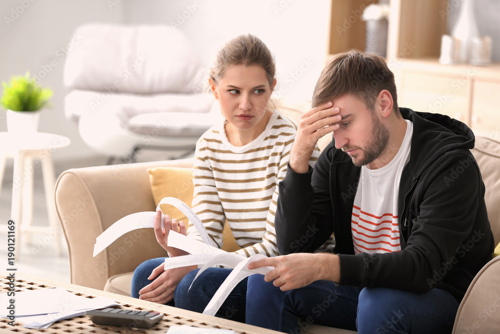 Couple arguing about money at home. Problems in relationship Couple arguing about money at home. Problems in relationship