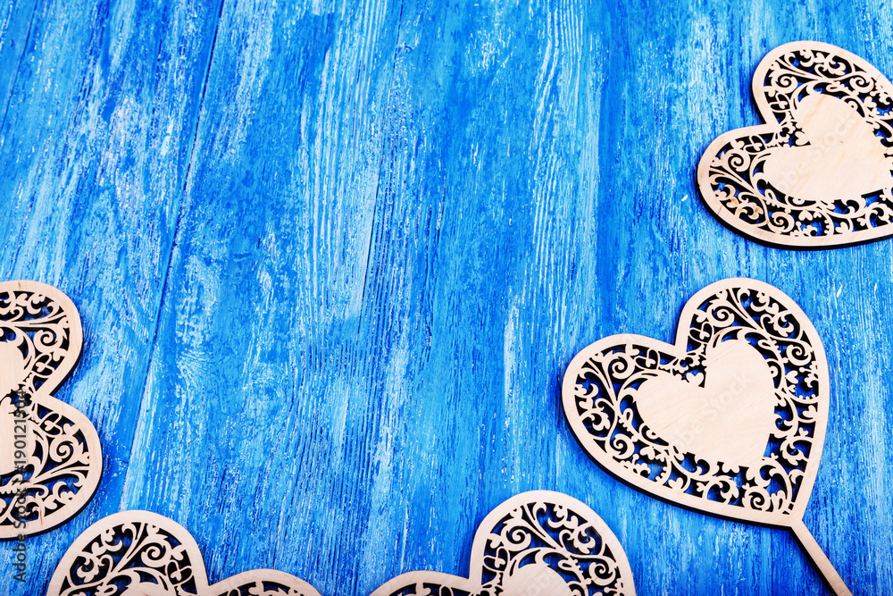 Patterns And Designs Of Green Wooden Heart On Blue Background With