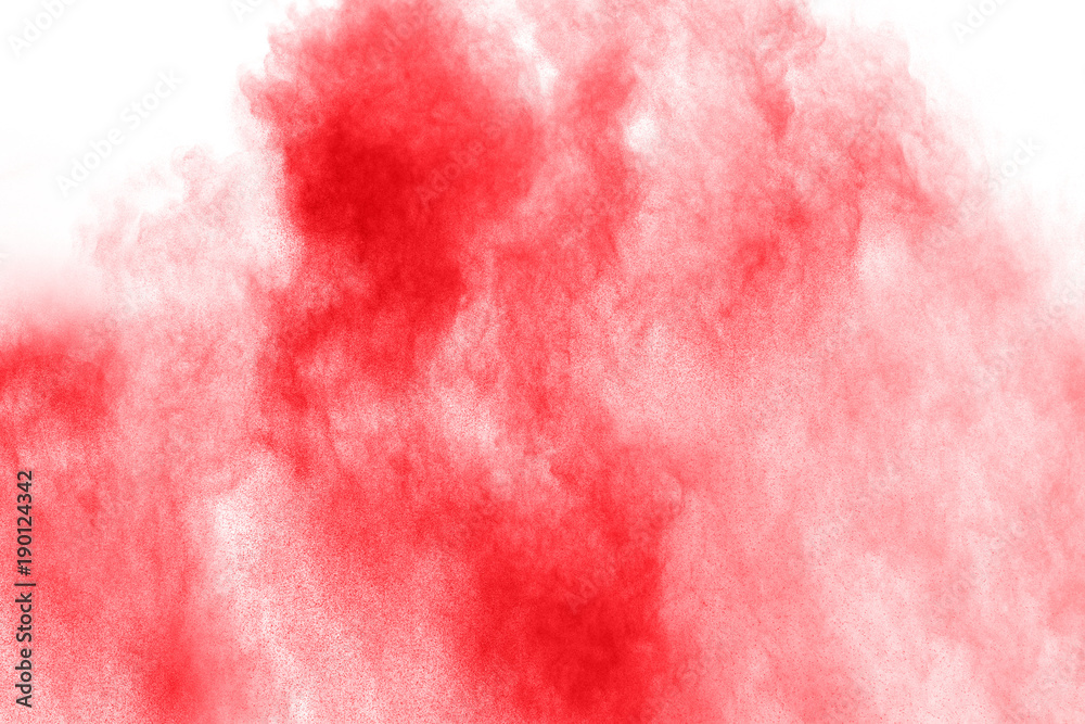 abstract red dust splattered on white background. Red powder explosion on white background. Freeze motion of red particles splash. abstract red dust splattered on white background. Red powder explosion on white background. Freeze motion of red particles splash.