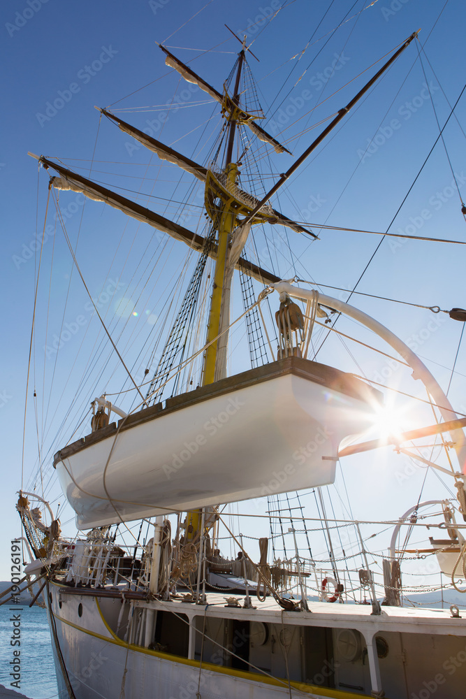 Obraz premium A sailboat with boats. Backlight