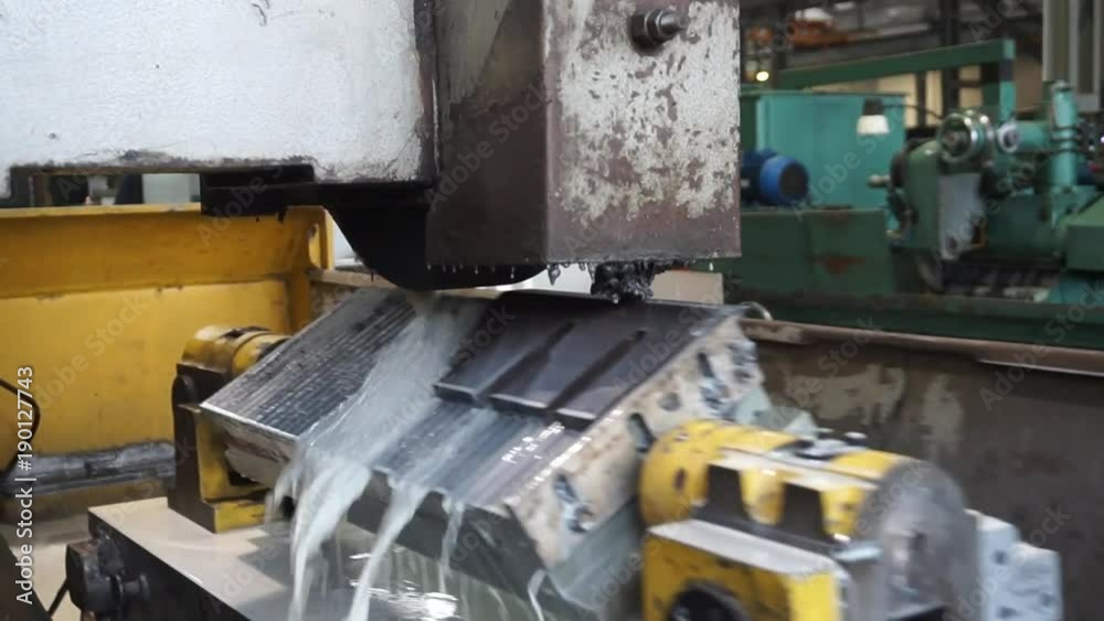 Grinding of metal on a machine with sparks. Metal industry split screen, welder, steel mill, grinding, cutting steel, foundry Grinding of metal on a machine with sparks. Metal industry split screen, welder, steel mill, grinding, cutting steel, foundry