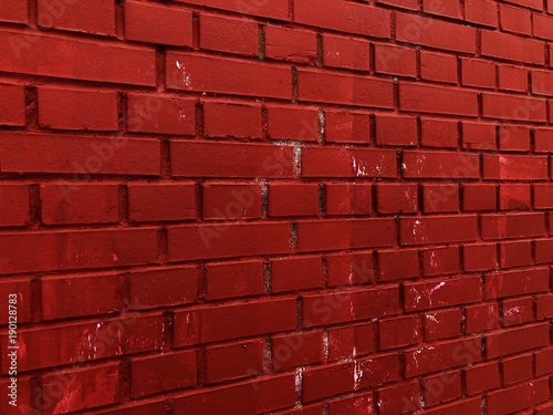 Brick wall with vivid red in the house