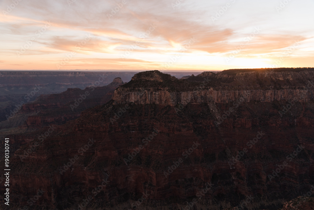 Pink sky above the Grand Canyon in Arizona after sunset. 