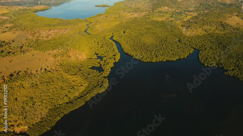 Landscape, at sunrise time with mountains, tropical forest, bay, mangrove forest. Coron, Philippines,Palawan, Busuanga.