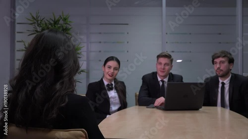 Business team meeting discussion young entrepreneurs group talking to manager in modern office 4K 