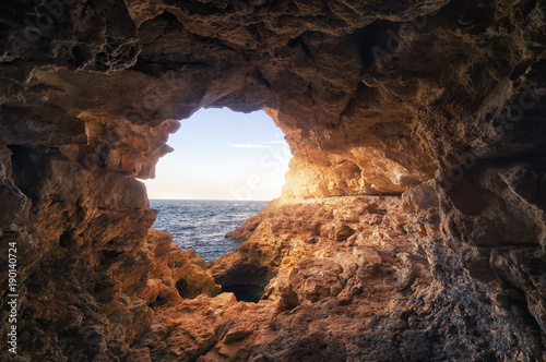 Canvas Print Cave in rock at the sea. Nature composition.