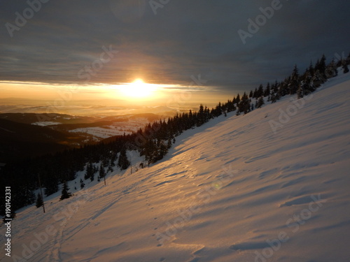 romantic sunset in Krkonose mountains in czech