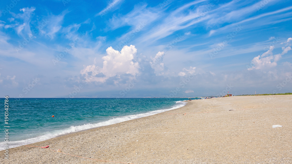 Panoramic view of a gravel beach in Calabria