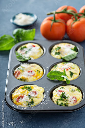 Healthy egg muffins, mini frittatas with tomatoes