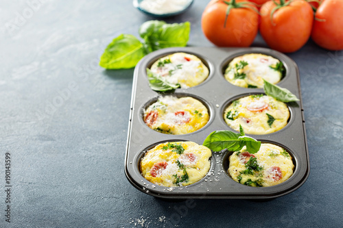 Healthy egg muffins, mini frittatas with tomatoes