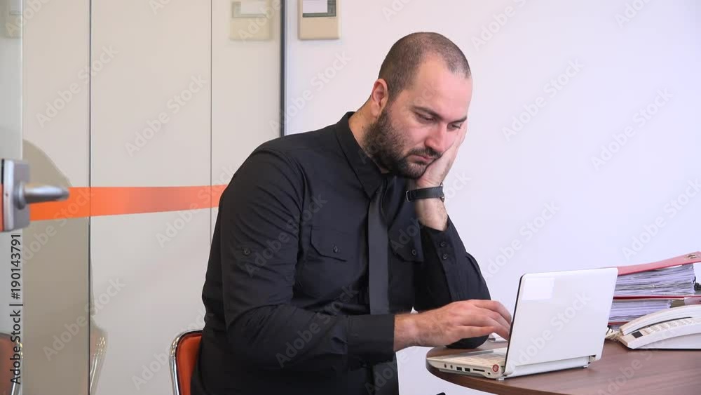 Bored not in the mood for work tired entrepreneur director typing laptop indoors Bored not in the mood for work tired entrepreneur director typing laptop indoors