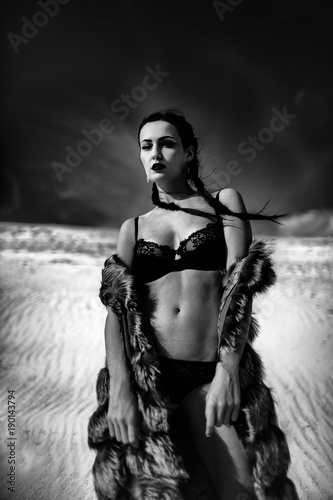 Obraz na płótnie attractive girl on the beach in my bra and coat w salonie