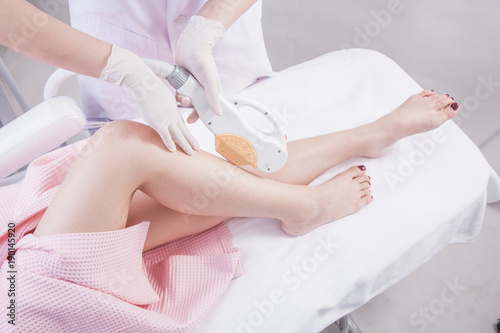 Laser epilation and cosmetology. Hair removal cosmetology procedure. Laser epilation and cosmetology. Cosmetology and SPA concept.